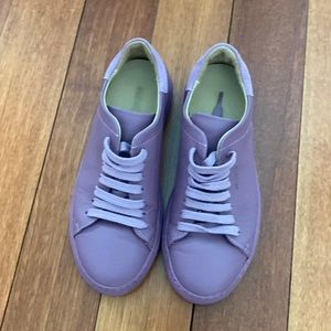 Purple sneaker. Size 7. Brand is Axel Arigato.